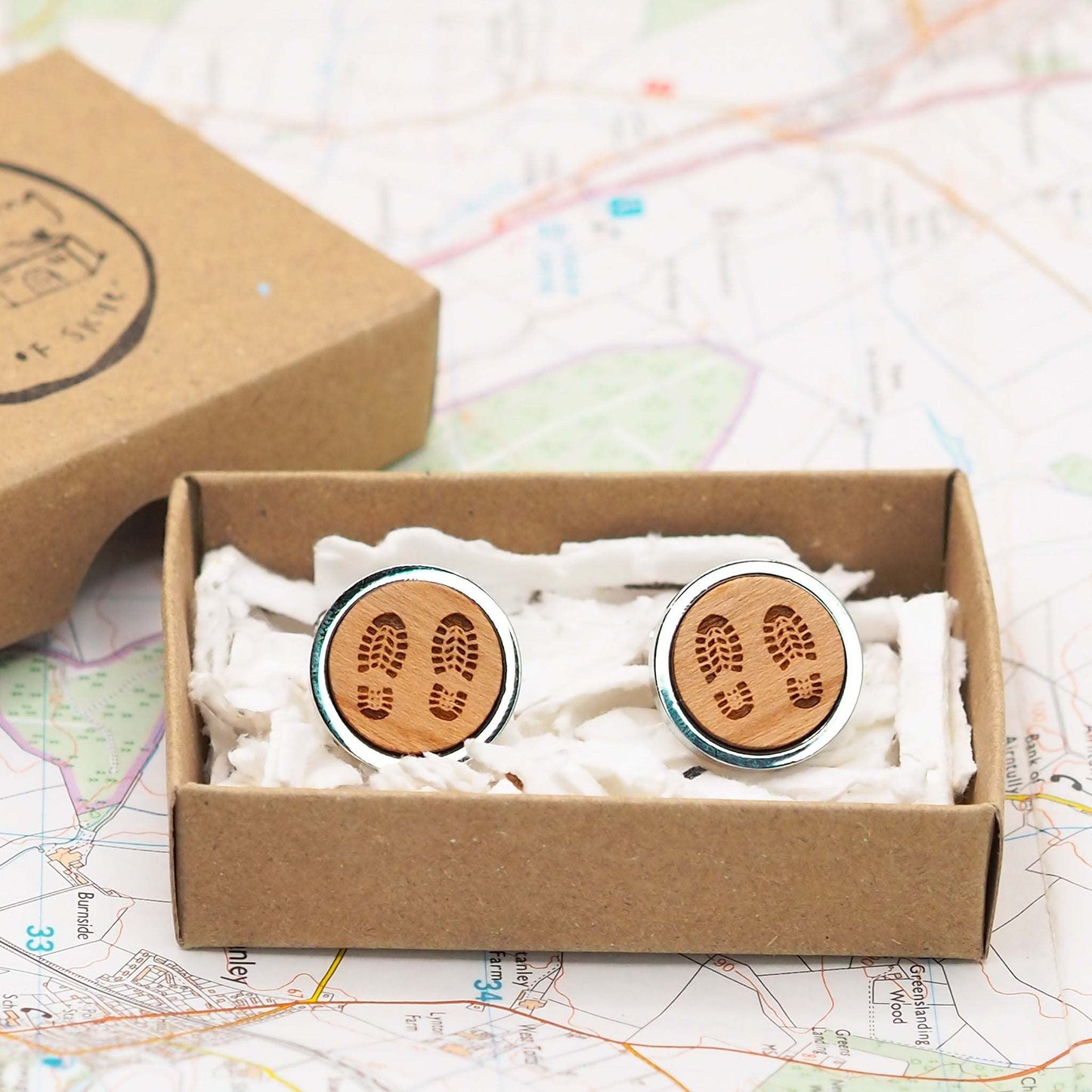 Boot print wooden cufflinks in our eco friendly recyclable packaging.