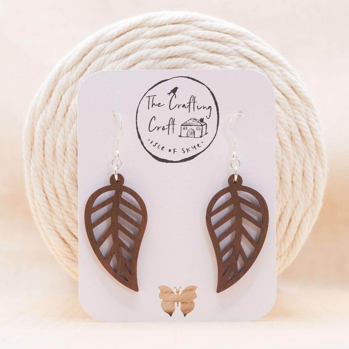 Leaf outline drop earrings with delicate beeswax protective coating. made on The Isle of Skye Scotland