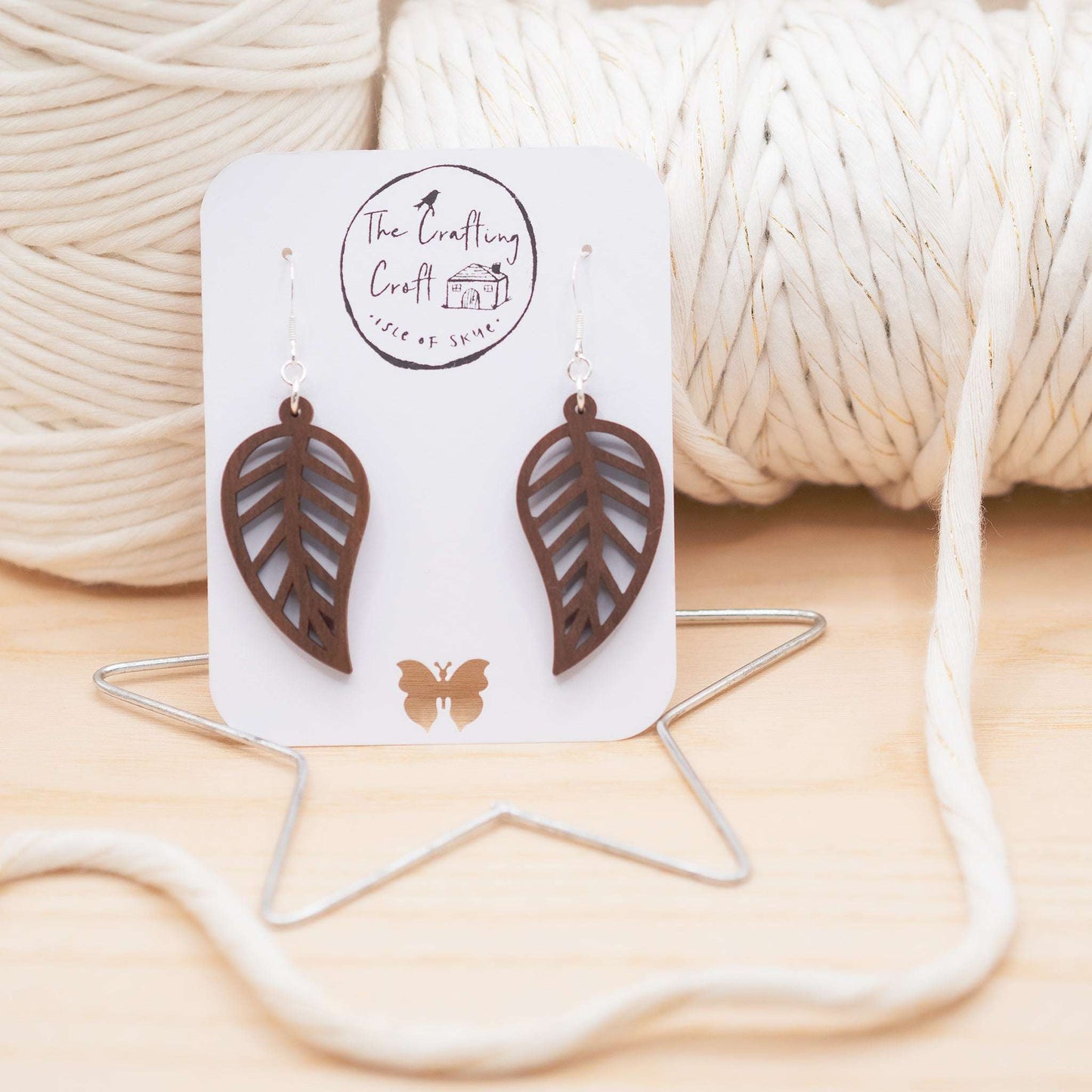 Leaf outline drop earrings laser cut and hand finished on Skye