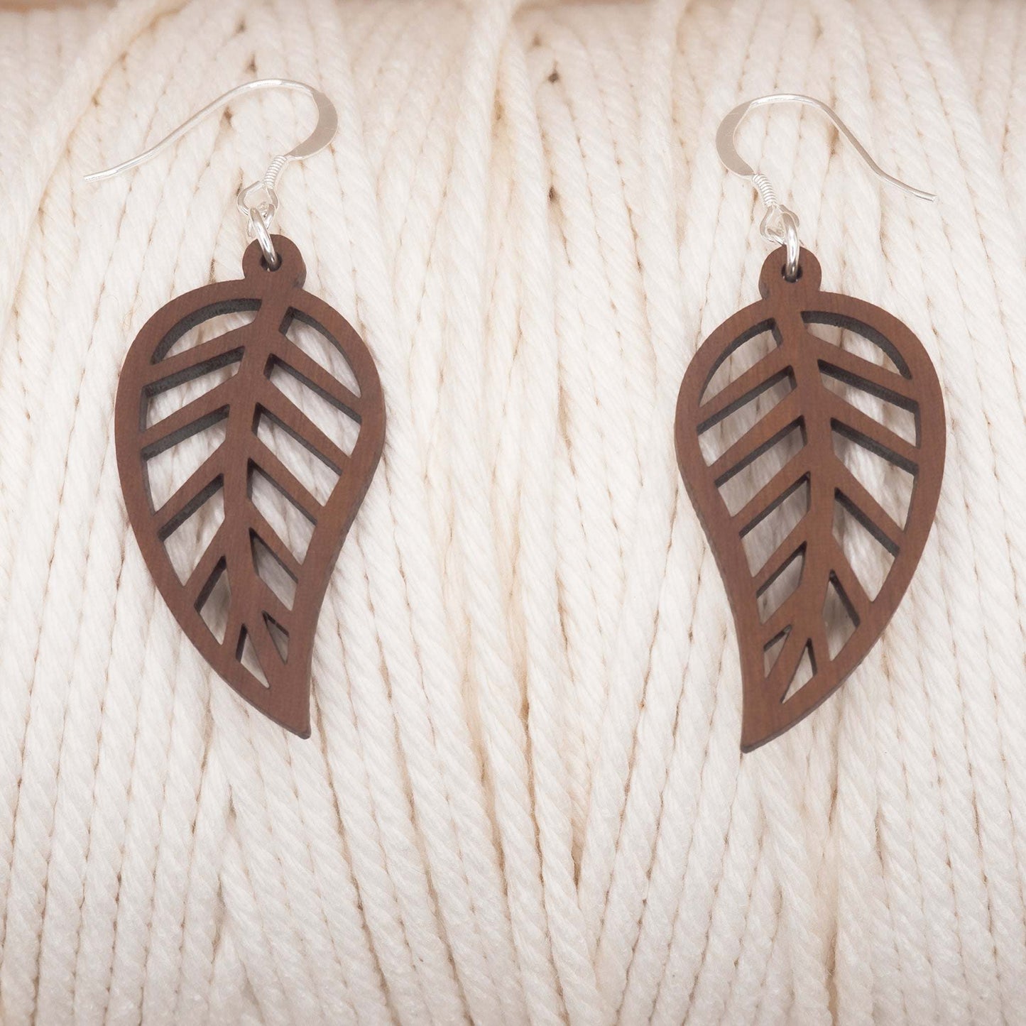 Leaf outline drop earrings, solid walnut wood with sterling silver hooks