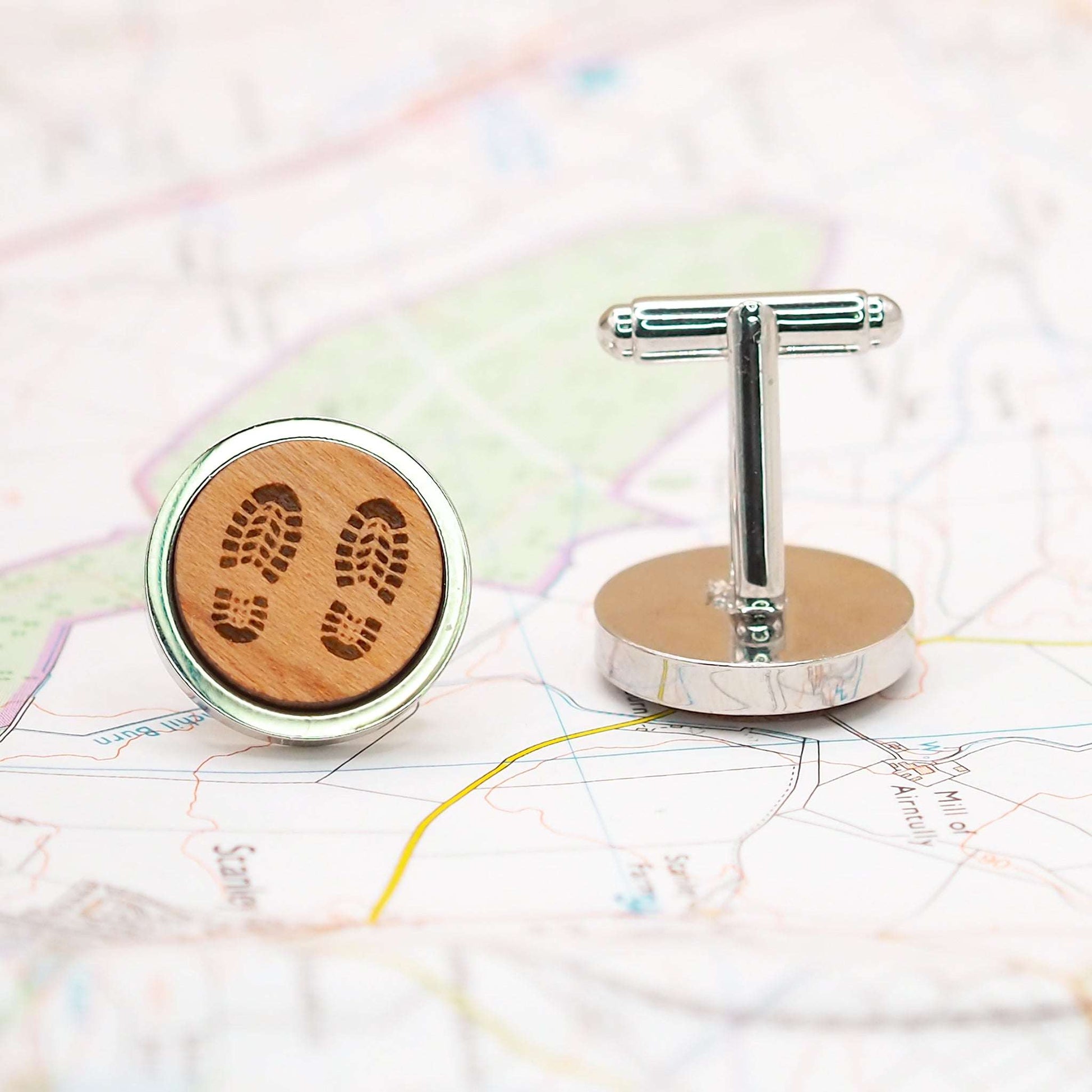 Step out in style with our boot print wooden cufflinks in rhodium bezels.
