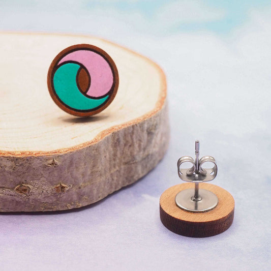 Pink and turquoise swirl stud earrings on sustainable cherry wood with surgical steel backs.