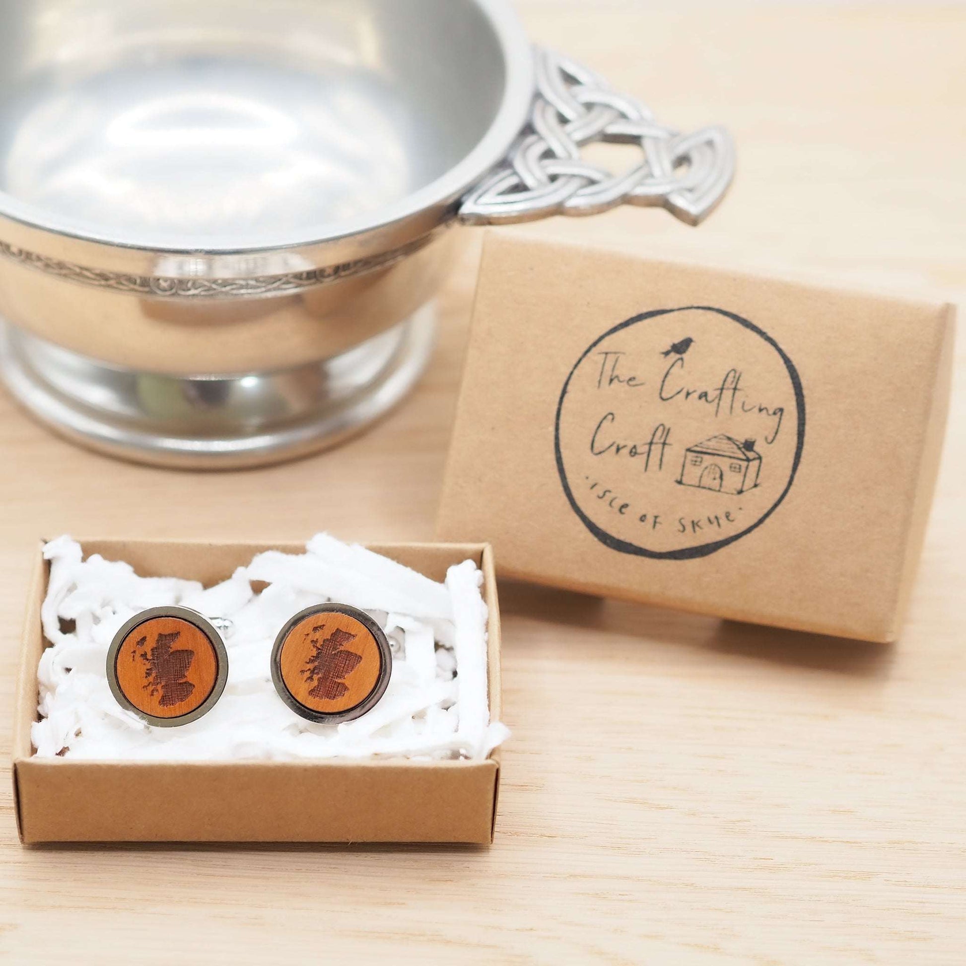 Eco-friendly Scotland outline wooden cufflinks in rhodium bezel packaging.