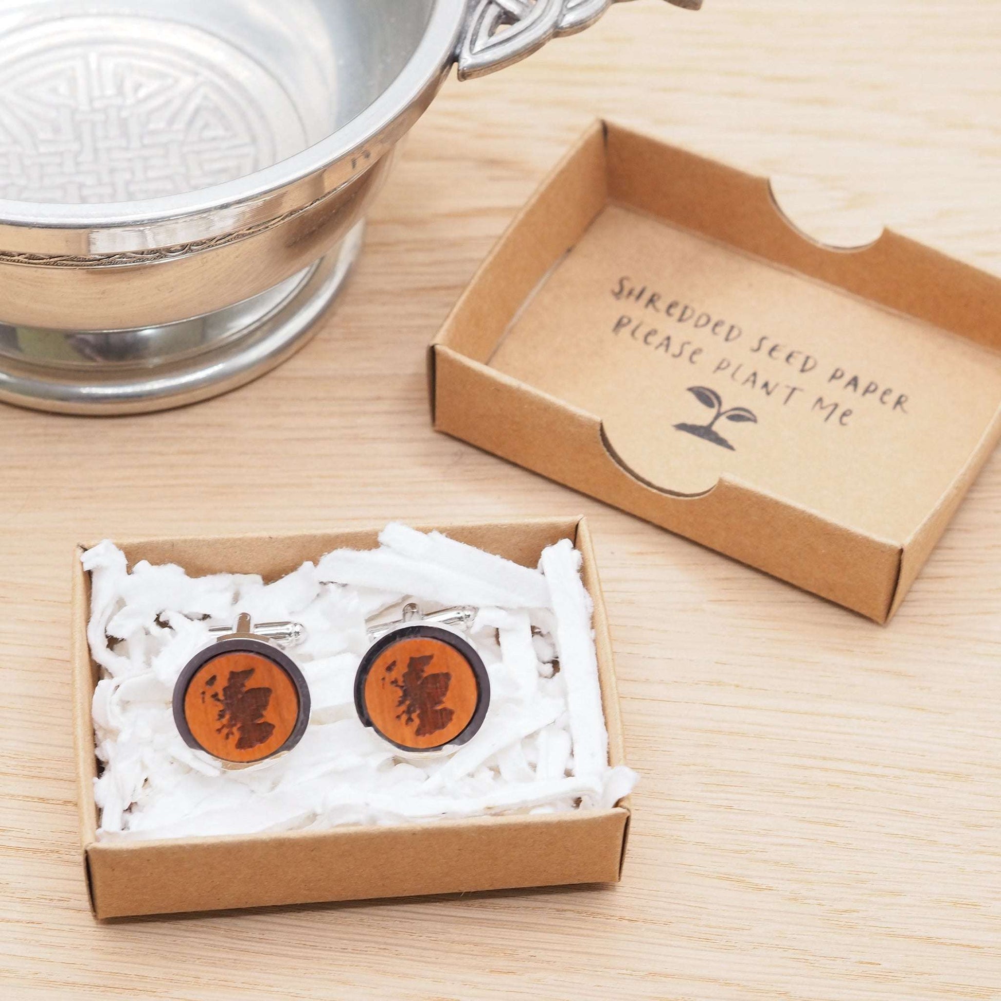 Eco-friendly Scotland outline wooden cufflinks with engraved map in rhodium bezel, presented in a recyclable box.