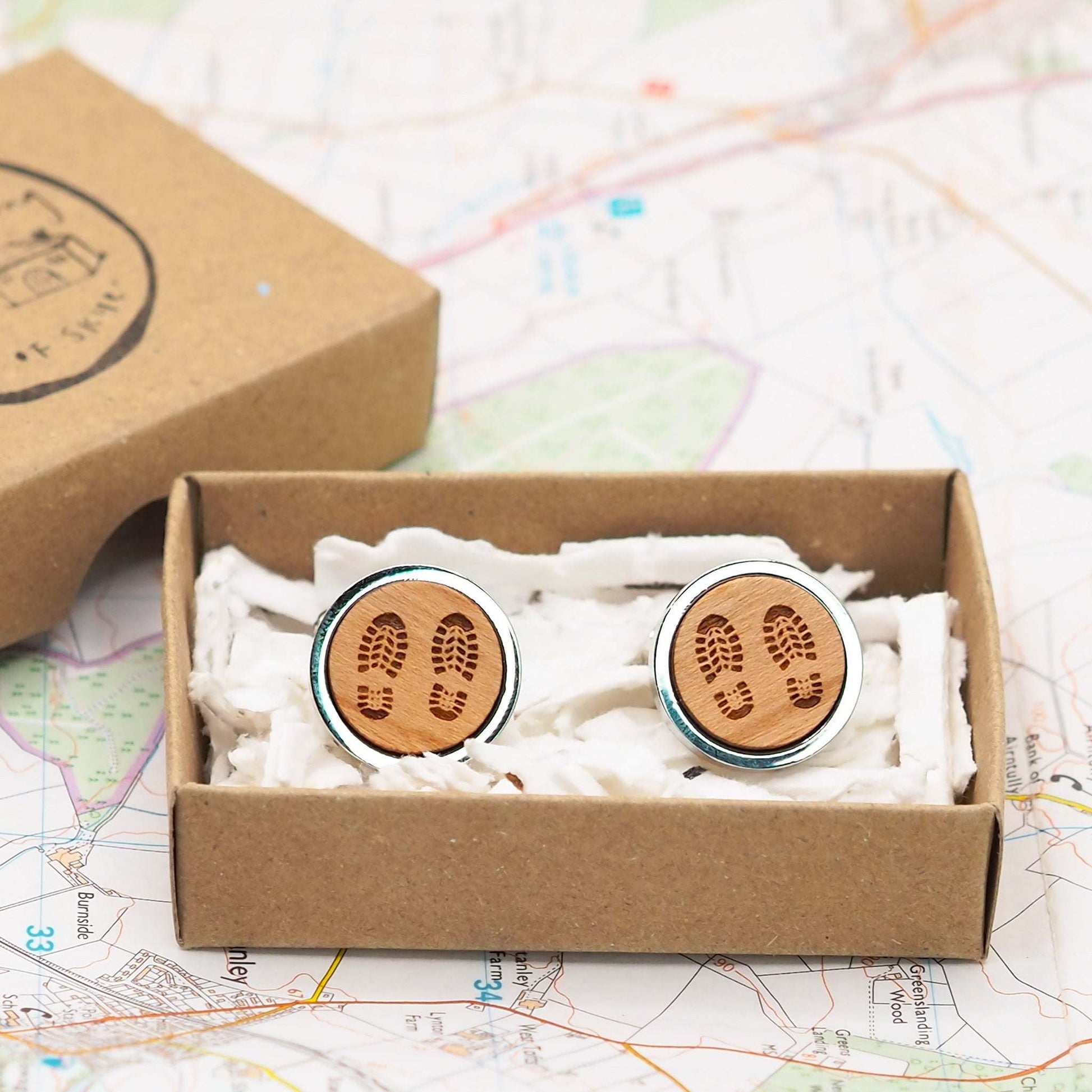 Boot print wooden cufflinks in our eco friendly recyclable packaging.