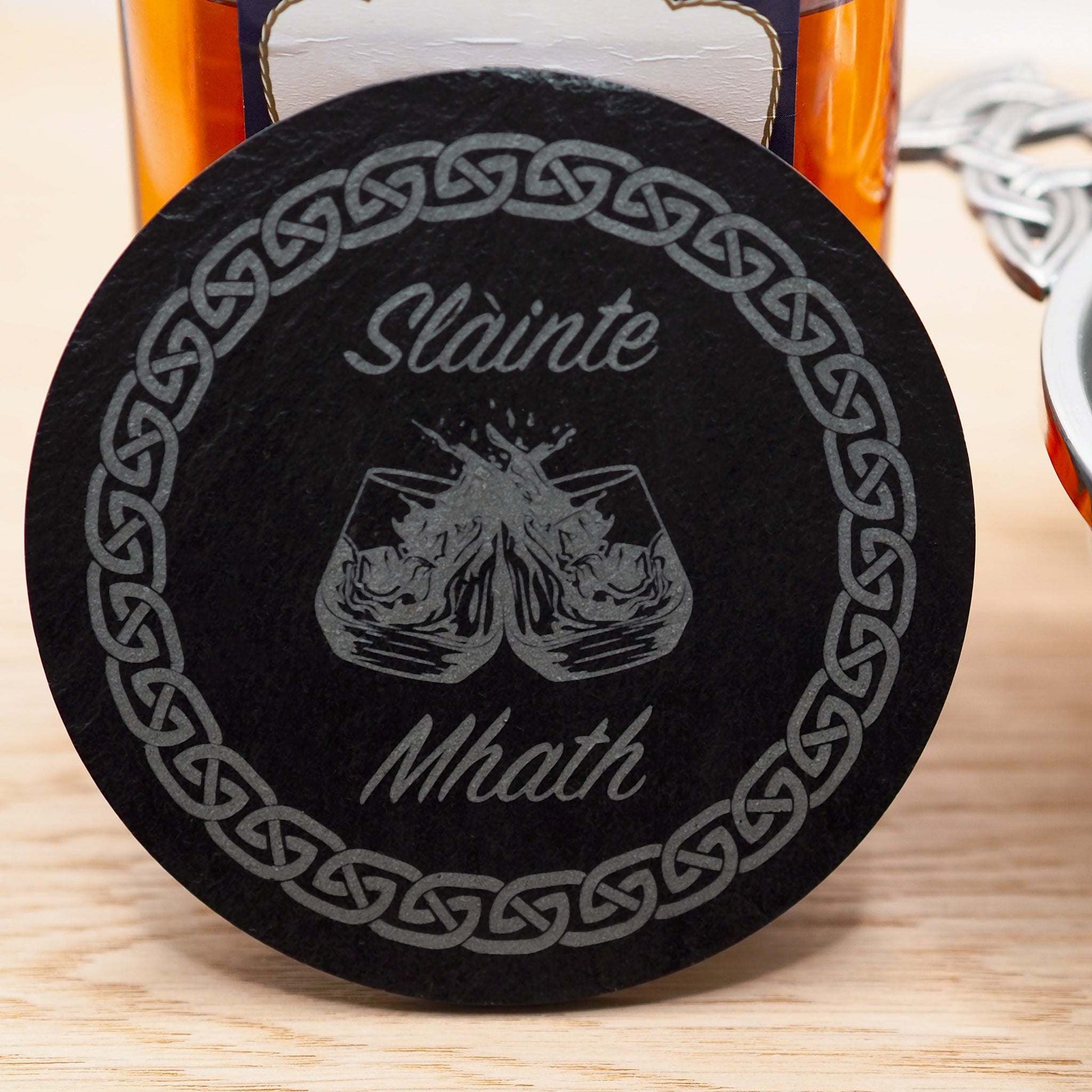 Slainte Mhath Gaelic slate coaster with engraved Celtic design and Scottish toast.
