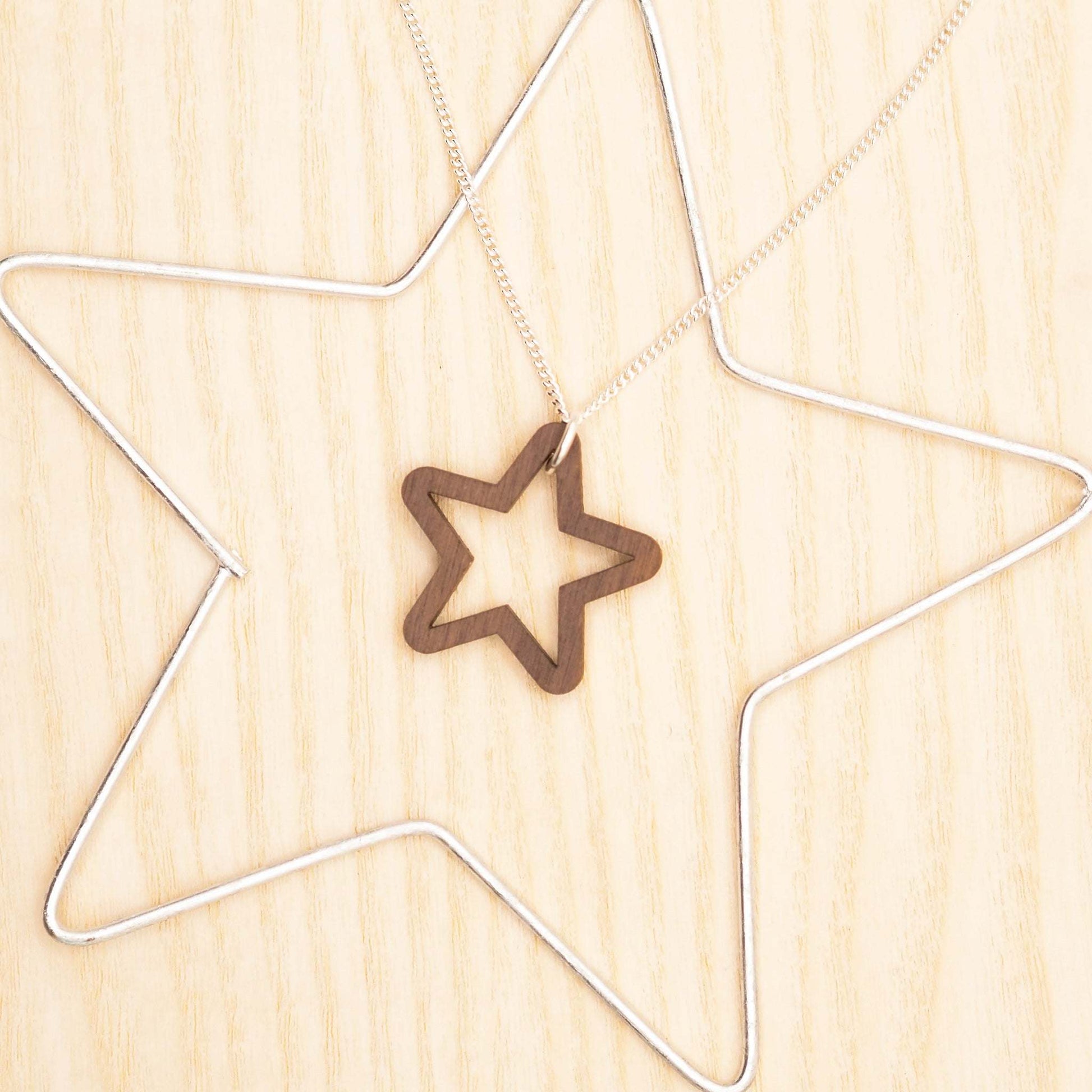 Chunky star necklace with wooden star pendant on recycled sterling silver chain.