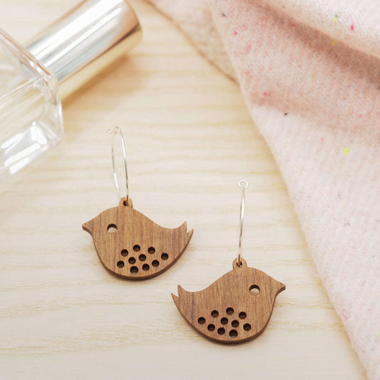 Quirky bird hoop engraved earrings made from walnut wood with sterling silver hoops.