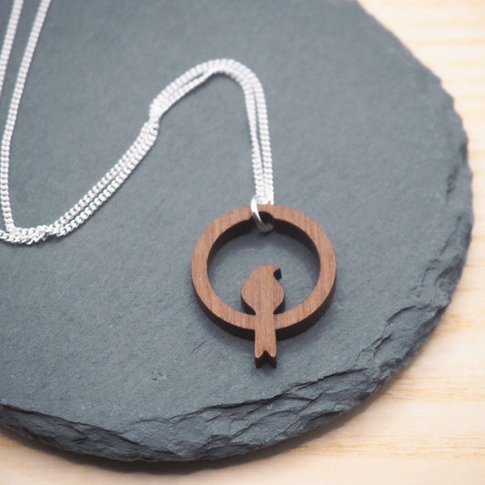 Wooden bird hoop necklace on recycled sterling silver chain.
