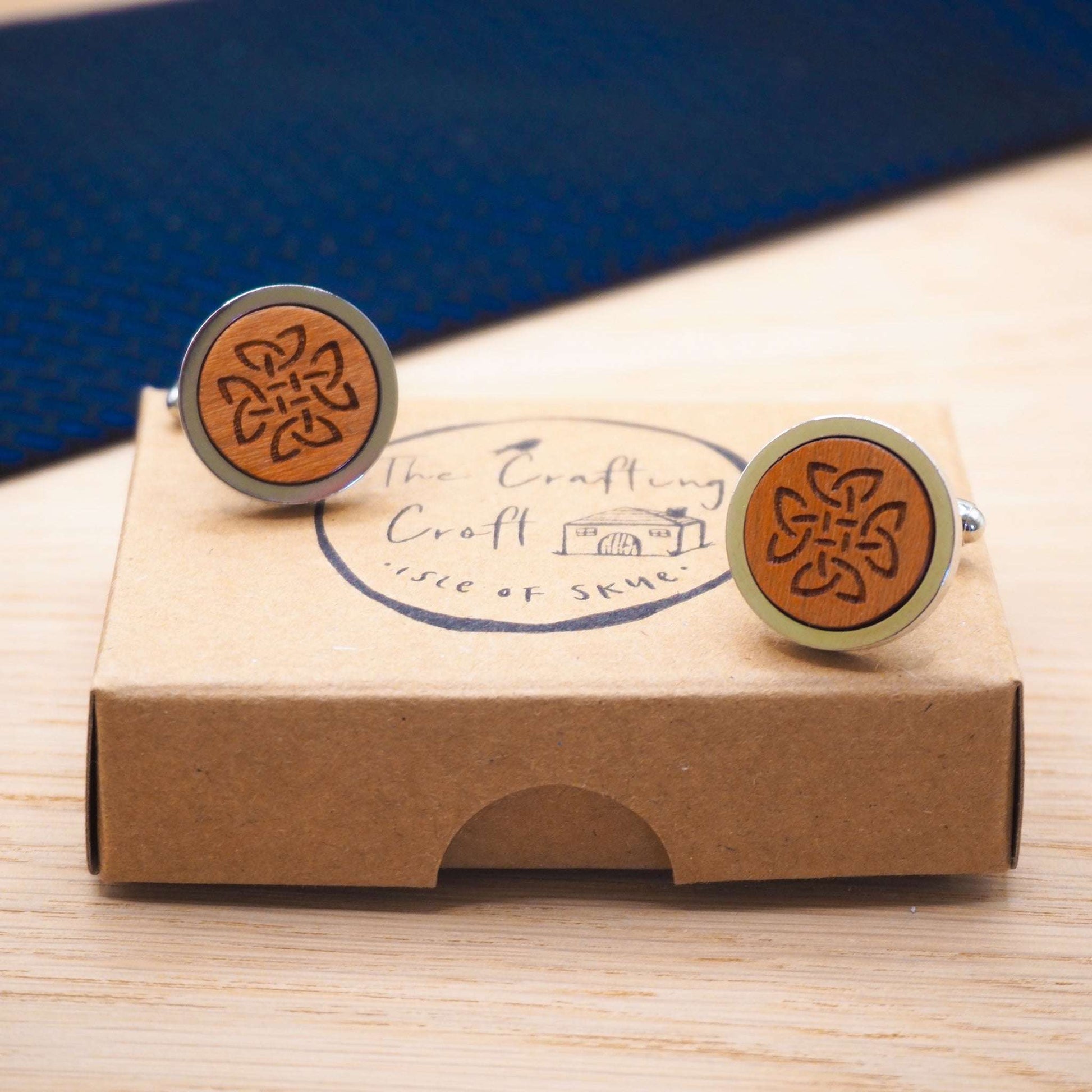 Celtic knot wooden cufflinks on rhodium bezel, eco-friendly packaging, cherry wood.