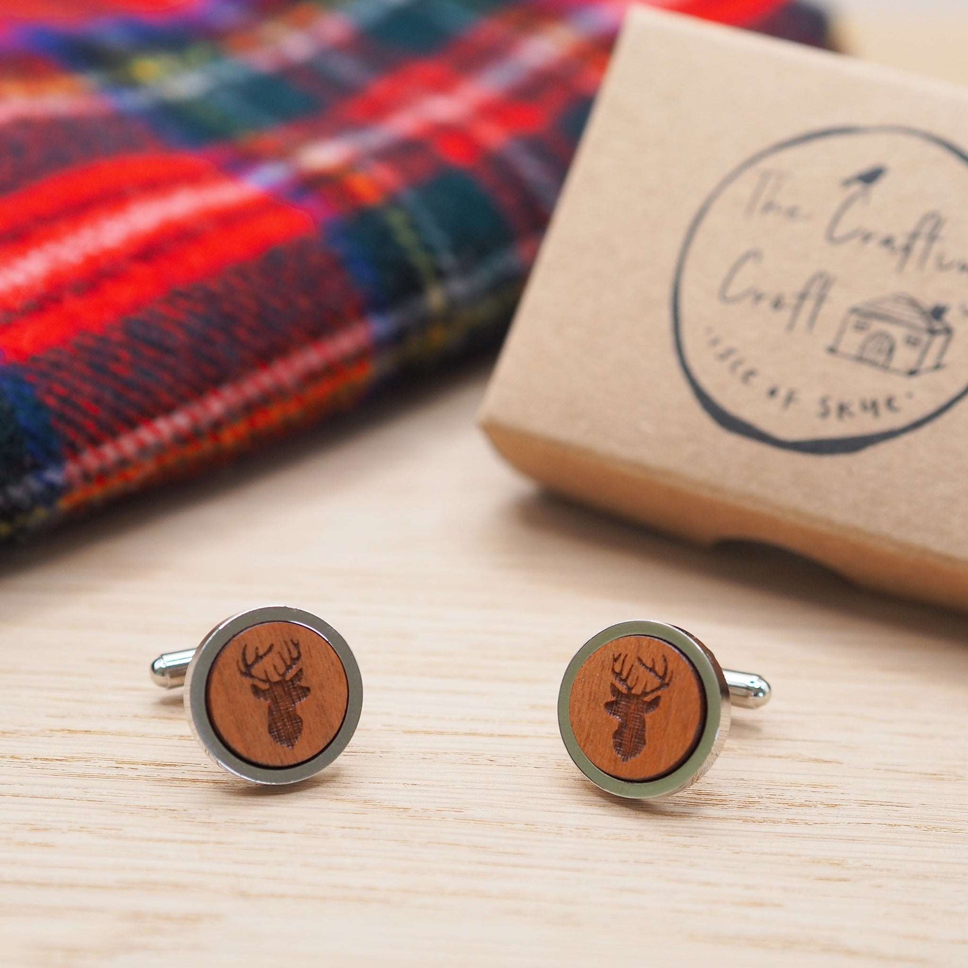 Stags head wooden cufflinks intricately engraved in cherry wood with rhodium bezel, eco-friendly gift box.