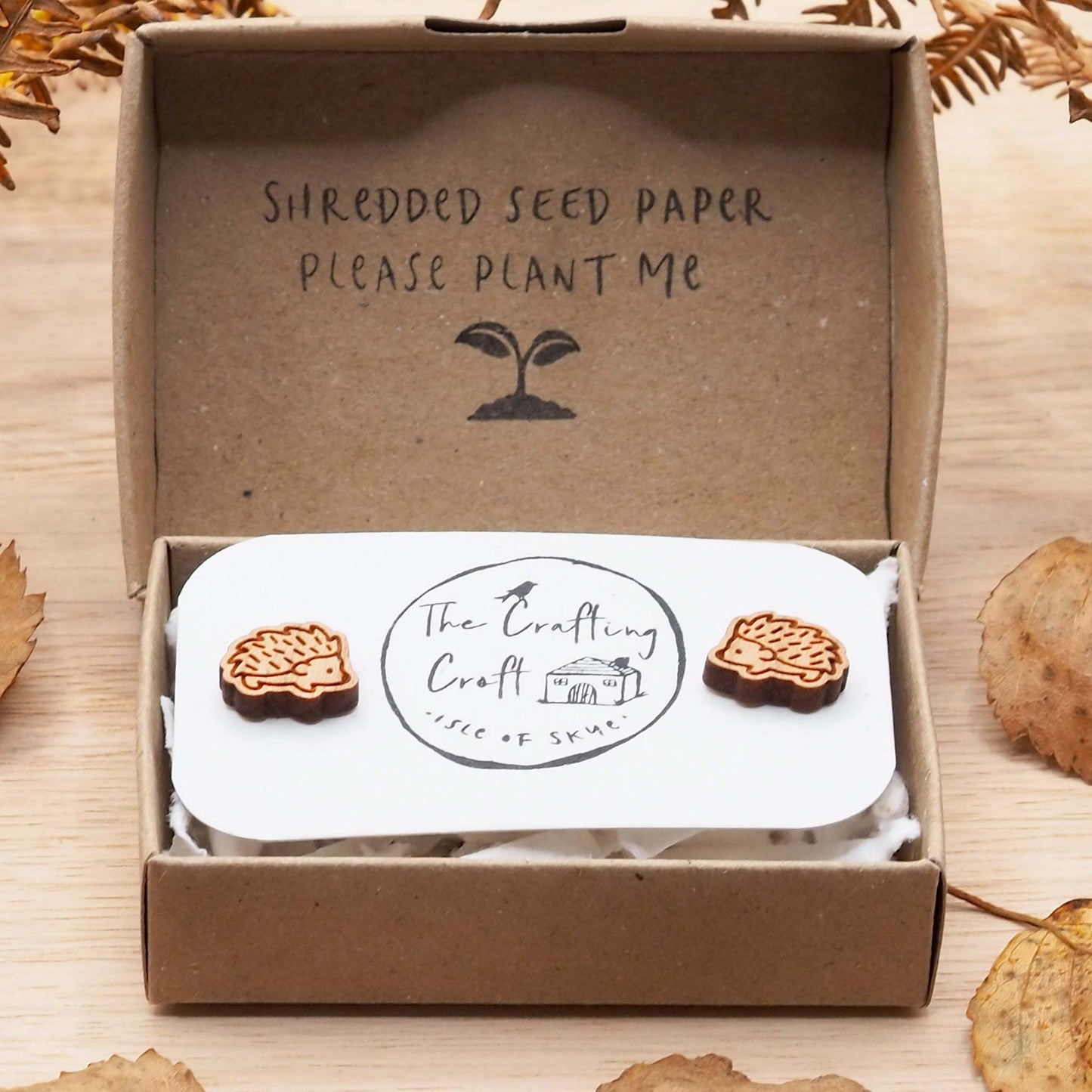 Woodland charm wooden hedgehog stud earrings in eco-friendly gift box.