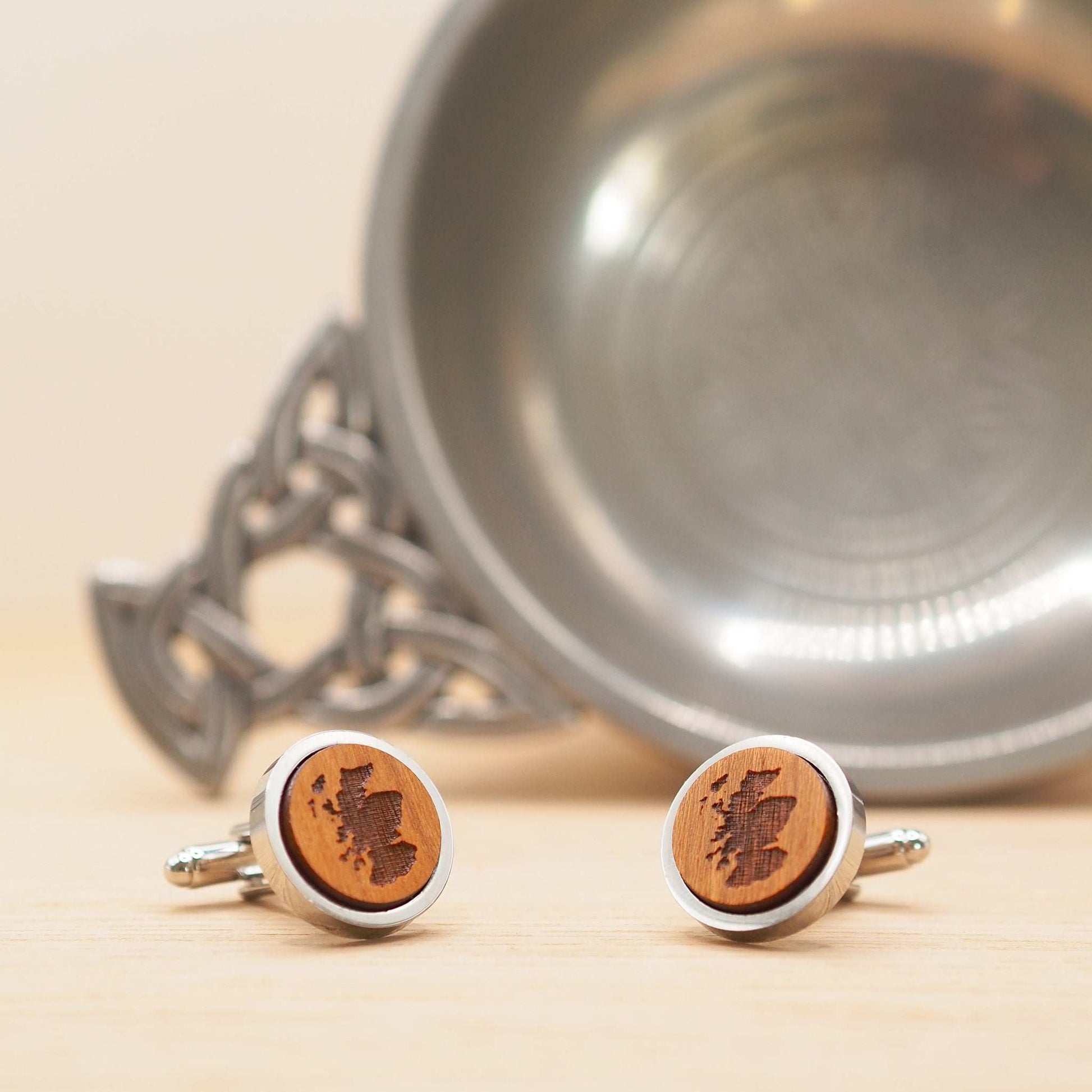 Scotland outline wooden cufflinks with engraved map design in silver-tone rhodium bezel.